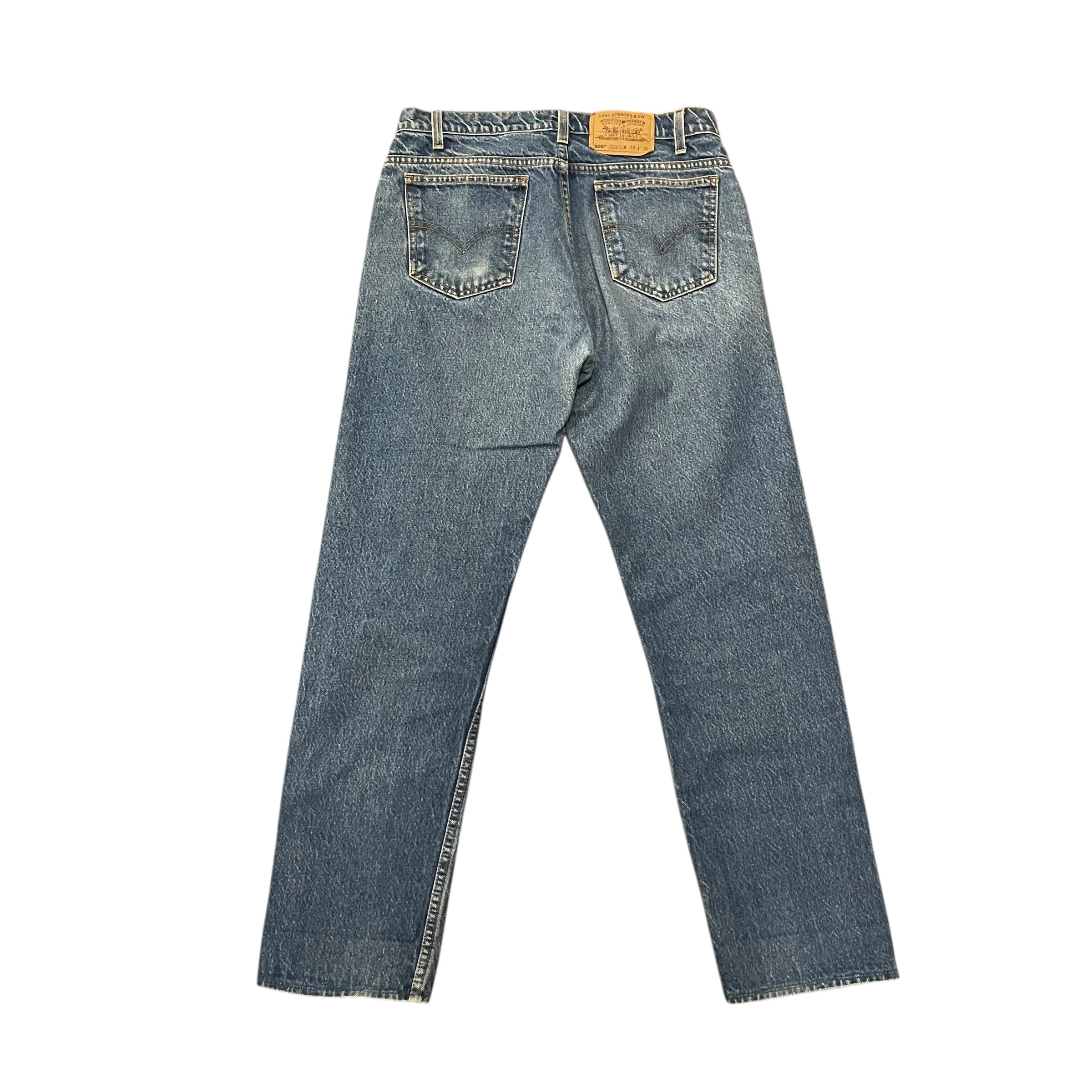 Jean en jean délavé coupe droite classique style années 90